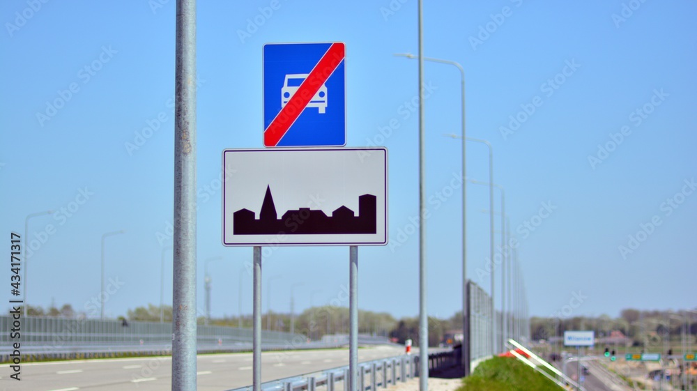 Road sign: Built-up area and end of highway Road sign: Built-up area and end of highway