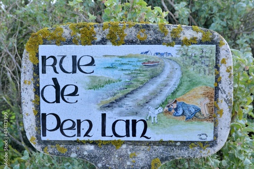old sign in a street in Brittany. France photo
