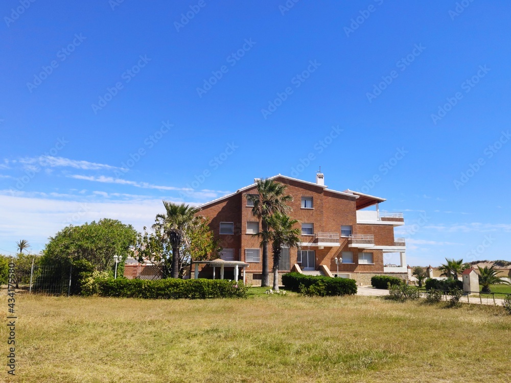 townhouse on the outskirts in the countryside or on the beach away from the city