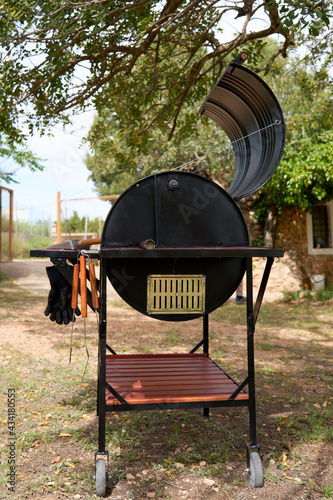 excellent portable barbecue made by hand in black.