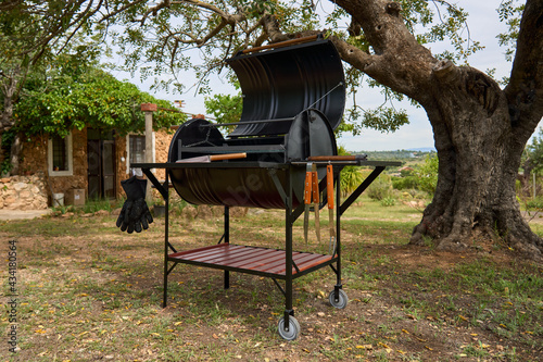 excellent portable barbecue made by hand in black.