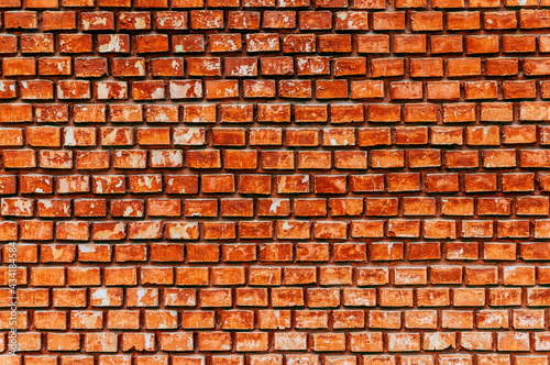 Red brick weathered wall background 