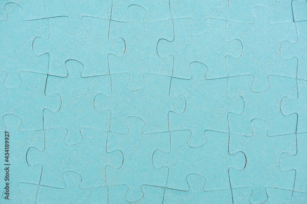 Blue puzzle pieces background. Top view Blue puzzle pieces background. Top view