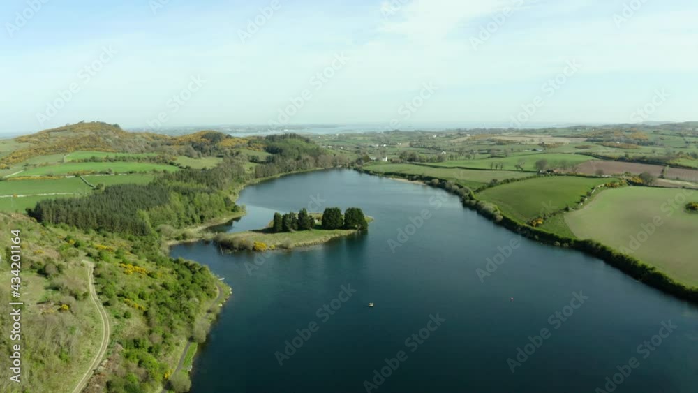 Aerial Flight Over lough money area countryside, Downpatrick, Northern Ireland during Spring morning time Hiking and Tourism Concept