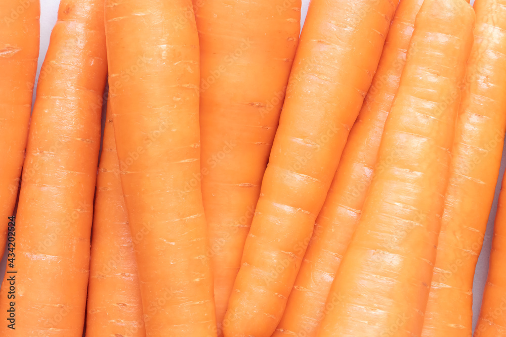 Fresh orange carrots, close-up view, group photo Fresh orange carrots, close-up view, group photo