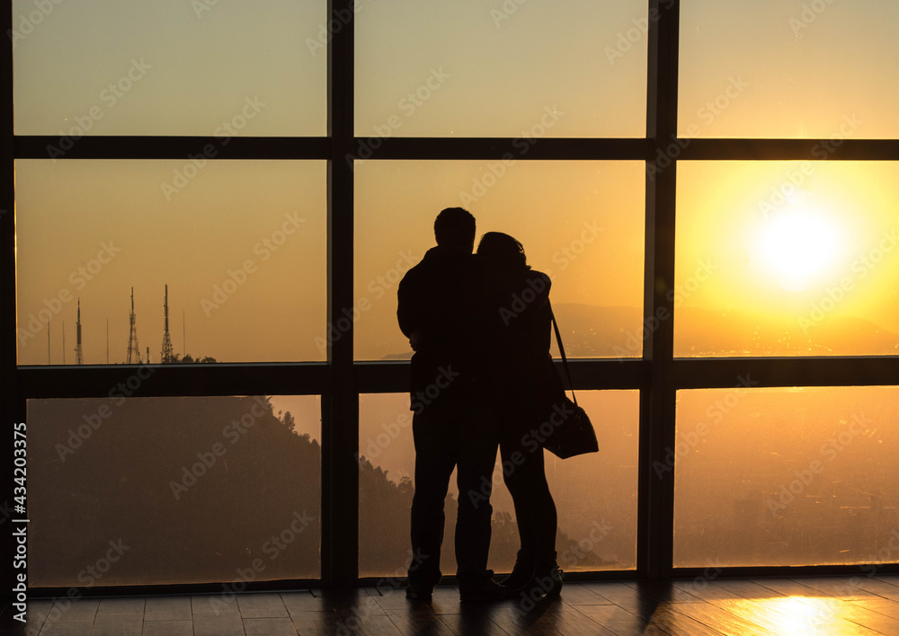couple in a viewpoint of a skyscraper