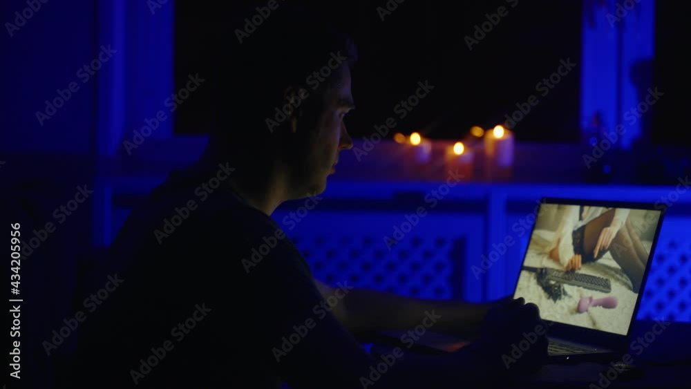 Man chatting with webcam model late at night. Man chatting with webcam model late at night.