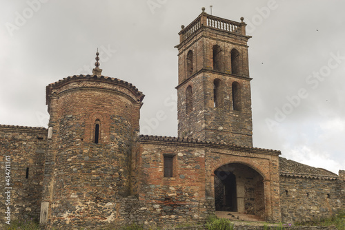 Ancient abandoned Mosque in Almonaster la Real, Spain under a cloudy sky photo