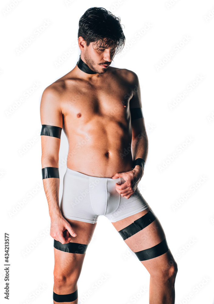 Fototapeta premium Handsome man posing in underwear on white background