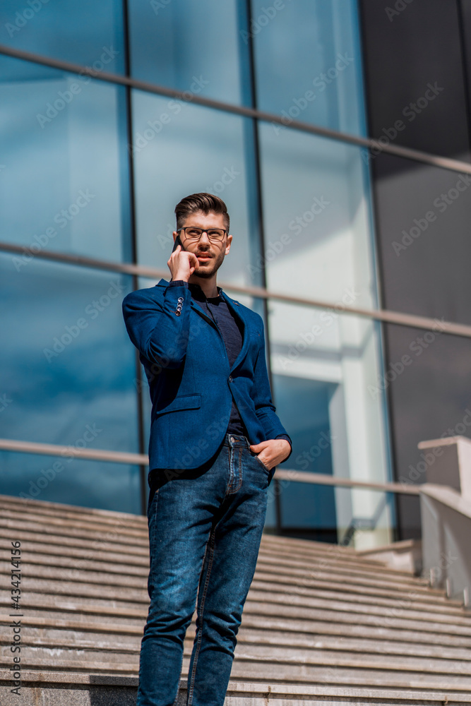 Cheerful mobile manager using phone Cheerful mobile manager using phone