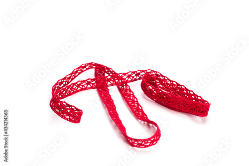 Braid, cords, ribbons for needlework on a white background.