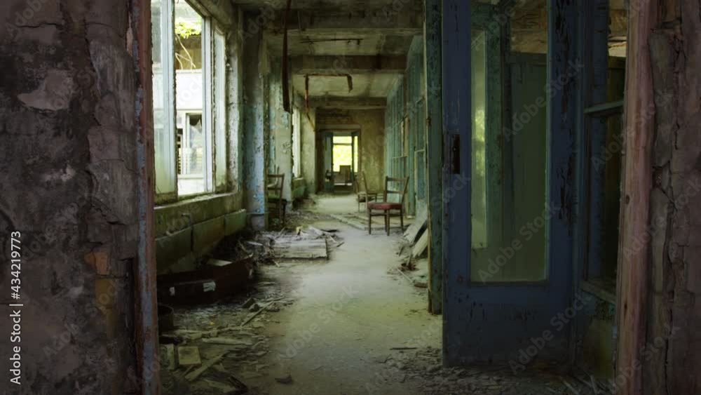 Creepy abandoned corridor of Pripyat commercial building, zoom out view Creepy abandoned corridor of Pripyat commercial building, zoom out view
