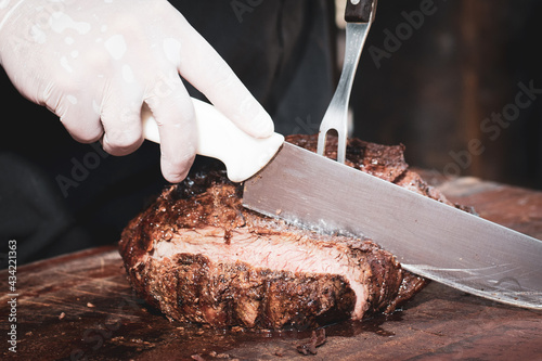 cutting the meat