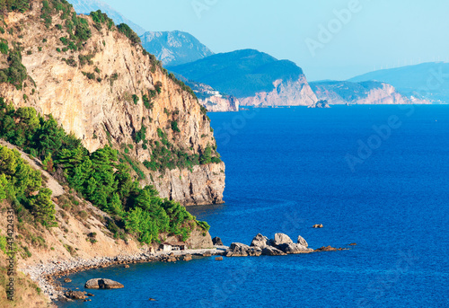 Majestic view of Adriatic Sea high cliffs . Beautiful nature of Montenegro with mountains and sea . Panoramic seaside view