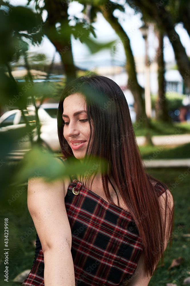 Young girl enjoys a warm afternoon, expresses great happiness. Young girl enjoys a warm afternoon, expresses great happiness.