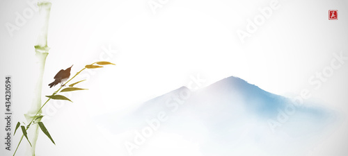 Little bird sitting on bamboo branch and far blue mountains. Traditional oriental ink painting sumi-e, u-sin, go-hua. Translation of hieroglyph - zen