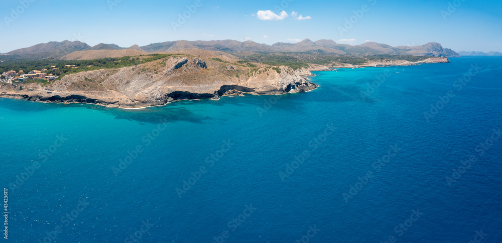 An aerial panorama of Mallorca island and Punta des Boc near Cala Mesquida