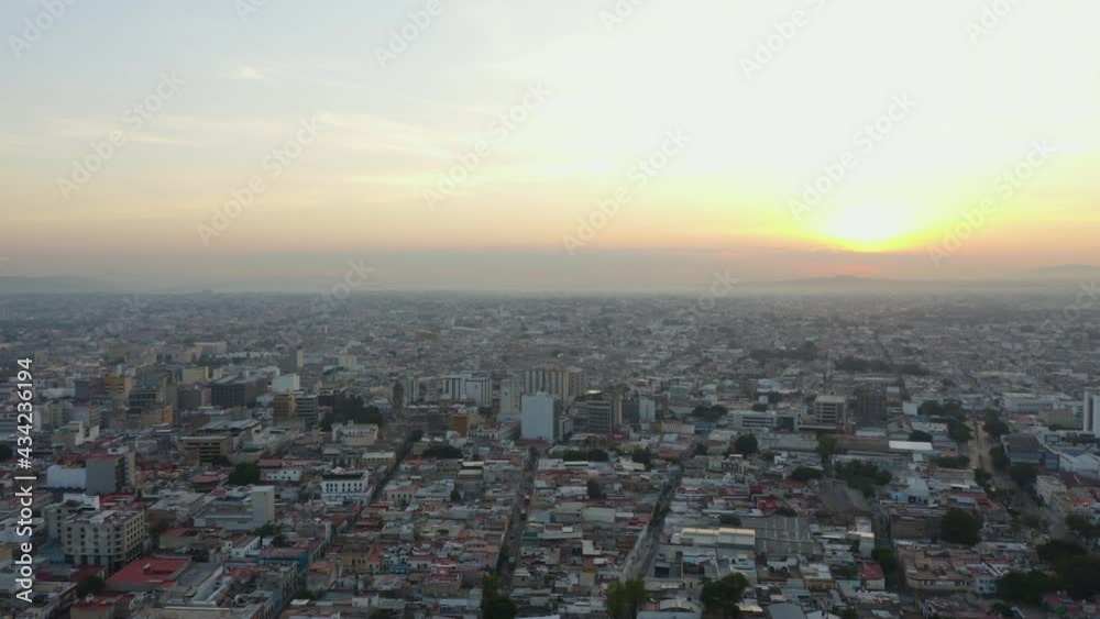 Drone Flies High Above Guadalajara City into Beautiful Sunset Drone Flies High Above Guadalajara City into Beautiful Sunset