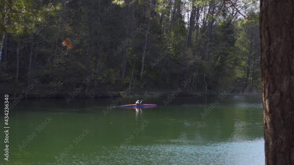 Kayaking in a Lake in Vilnius, Lithuania Kayaking in a Lake in Vilnius, Lithuania