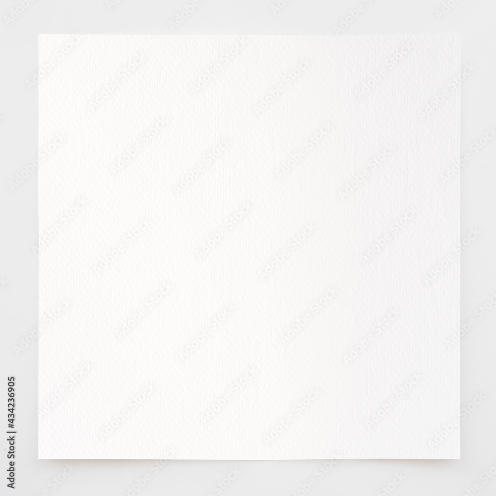 Watercolor paper texture background with clipping path. White paper sheet with a torn edges isolated on gray. Watercolor paper texture background with clipping path. White paper sheet with a torn edges isolated on gray.