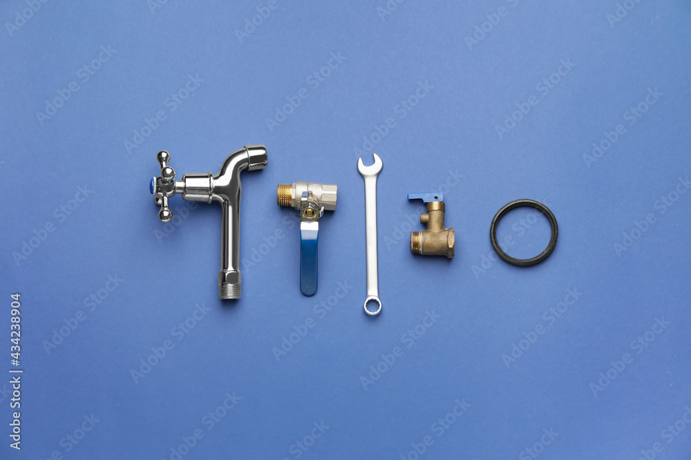 Set of plumber's items on color background Set of plumber's items on color background