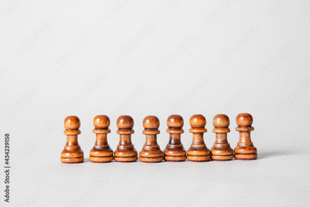 Chess pieces on light background Chess pieces on light background