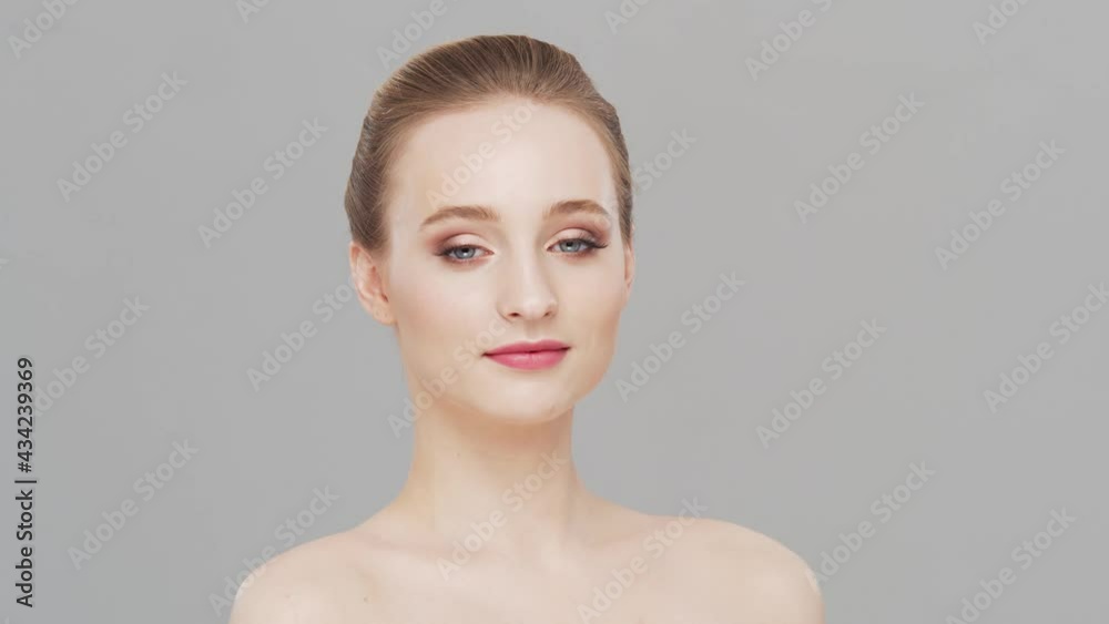 Studio portrait of young, beautiful and natural woman. Face lifting, cosmetics and make-up concept. Studio portrait of young, beautiful and natural woman. Face lifting, cosmetics and make-up concept.