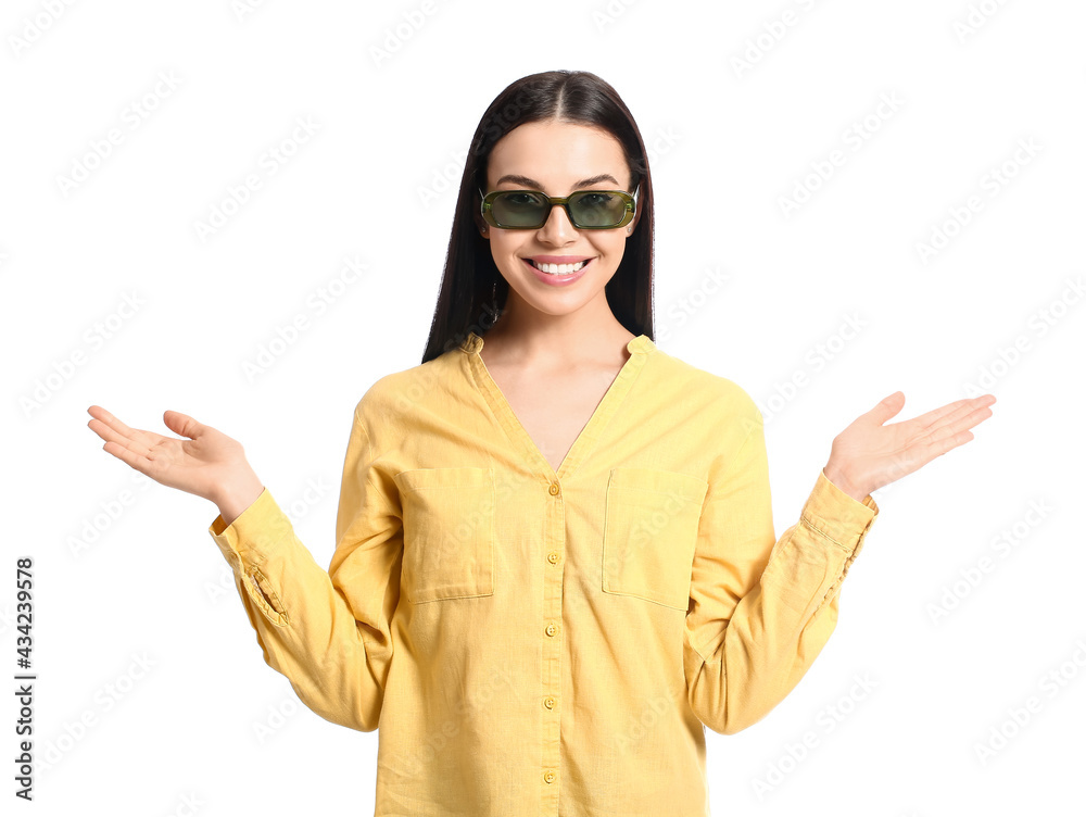 Beautiful young woman wearing stylish sunglasses on white background Beautiful young woman wearing stylish sunglasses on white background
