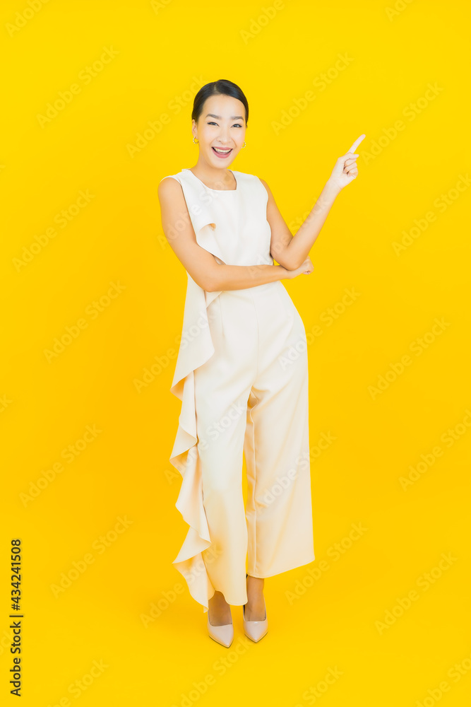 Portrait beautiful young asian woman smile with action Portrait beautiful young asian woman smile with action