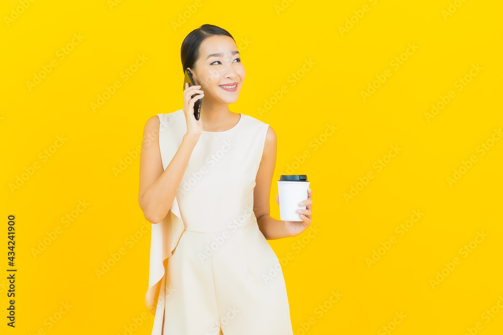 Portrait beautiful young asian woman smile with smart mobile phone Portrait beautiful young asian woman smile with smart mobile phone