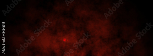 Fire embers particles over black background. Fire sparks background. Abstract dark glitter fire particles lights.