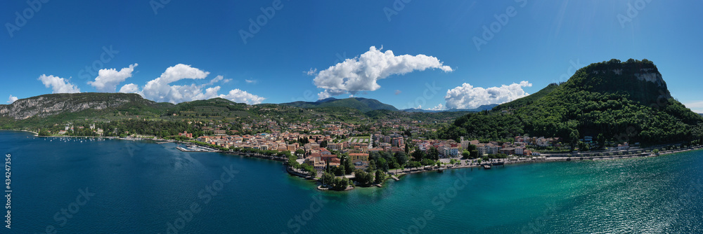 Panorama on corno. Top view of the Museum of Lake Garda on the coastline. Aerial view of the city of Garda, Lake Garda, Italy. Vista lago on the coastline.