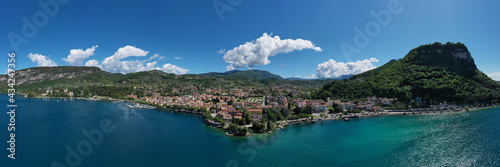 Panorama on corno. Top view of the Museum of Lake Garda on the coastline. Aerial view of the city of Garda, Lake Garda, Italy. Vista lago on the coastline.