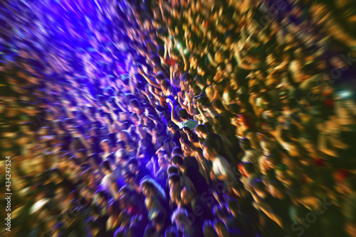 Zoom in effect on a blurred crowd