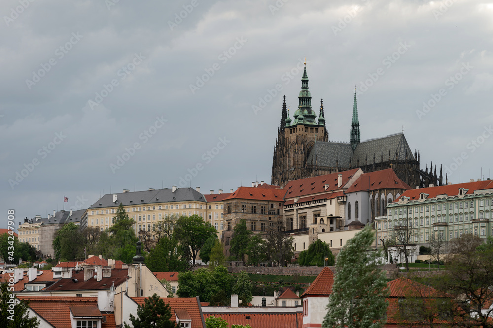 Sunset cloudy view of Prague with the Prague Castle, Czechia