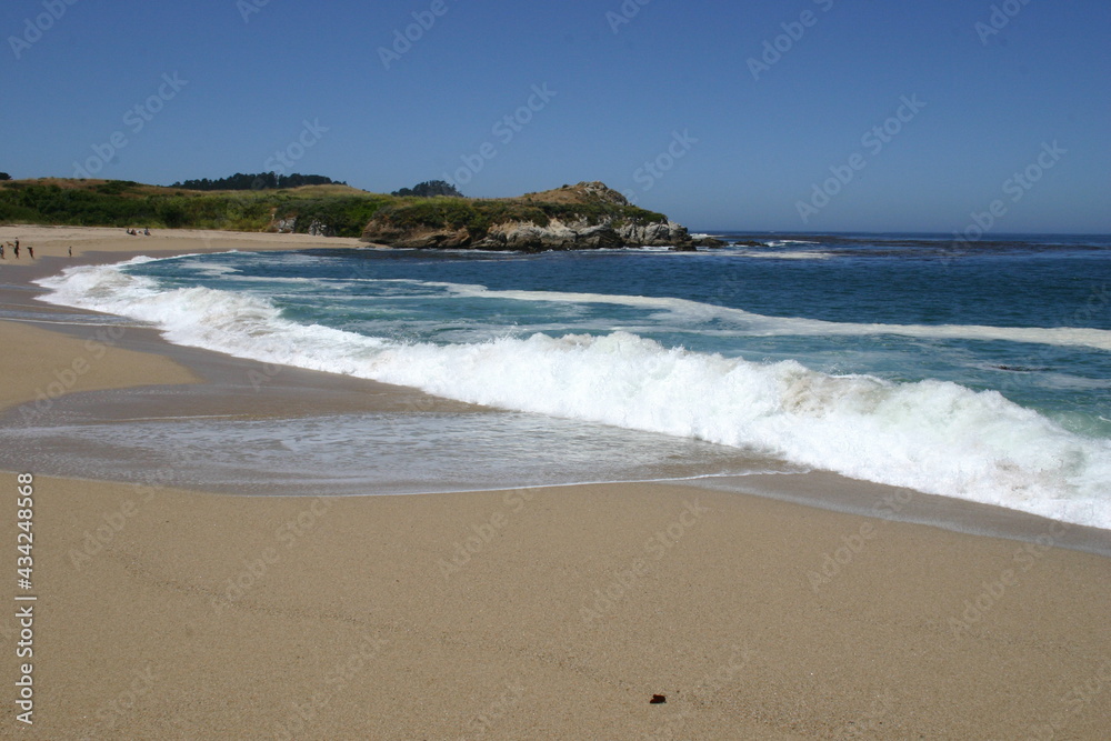 Carmel Beach Near Monterey California Showing Pristine Sand and Amazing Blue and White Waves Crashing on Shore