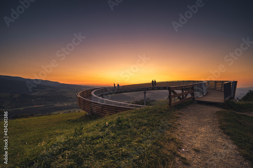 Picturesque sunset in Beskid S  decki seen from the tower in Wola Krogulecka  with views of the mountains and fields.