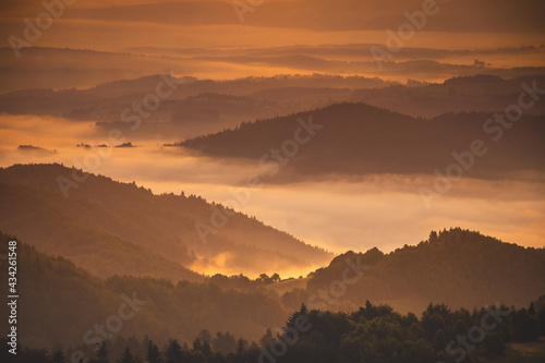 Summer morning seen from the observation tower in Koziarz in the Beskid Sądecki. Natural landscapes with great views.