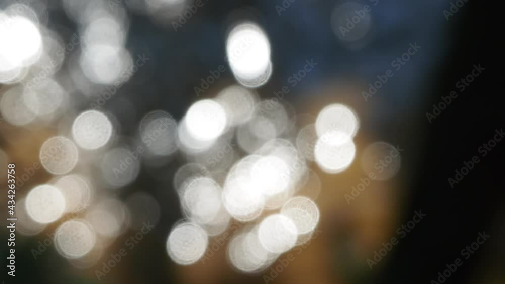 Soft focus bokeh light effects over a water background with lens flare. Soft focus bokeh light effects over a water background with lens flare.
