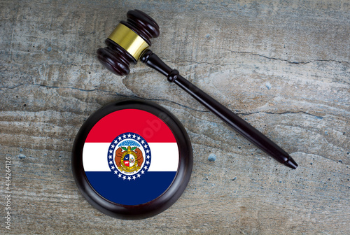 Photo Wooden judgement or auction mallet with of Missouri flag
