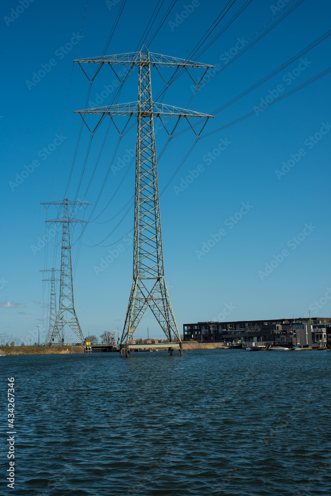 power lines and towers on the river