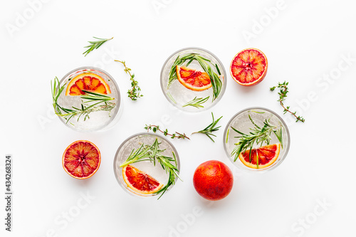 Sangria drink with blood orange grapefruit and rosemary. Top view