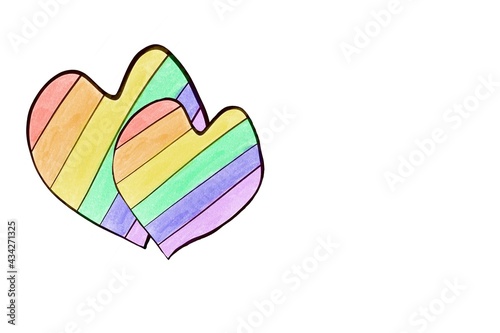 Drawing heart in rainbow colours, concept for celebrations of lgbtqai communities in pride month, June, around the world. photo