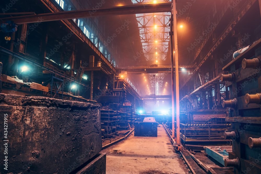 Obraz Factory interior. Heavy metallurgy industry. Foundry workshop. Steel Mill industrial plant. Metal manufacture. Large industrial building inside with metalwork equipment.
