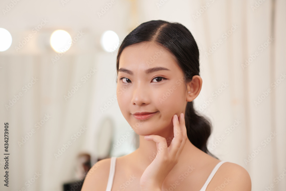 Happy pretty woman enjoy healthy soft moisturized hydrated skin, facial skincare rejuvenation moisture spa everyday treatment concept Happy pretty woman enjoy healthy soft moisturized hydrated skin, facial skincare rejuvenation moisture spa everyday treatment concept