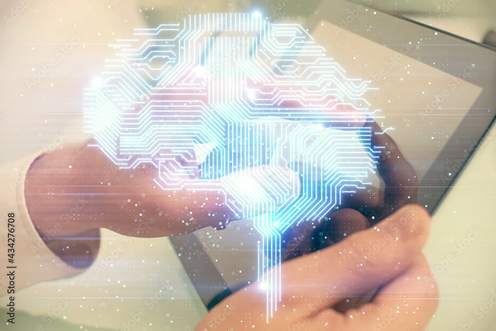 Fototapeta premium Double exposure of man's hand holding and using a digital device and brain hologram drawing. Data concept.