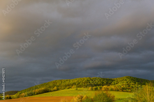 Beautiful rainbow over the roofs of the town of Schmalkalden - Thuringia - Germany photo