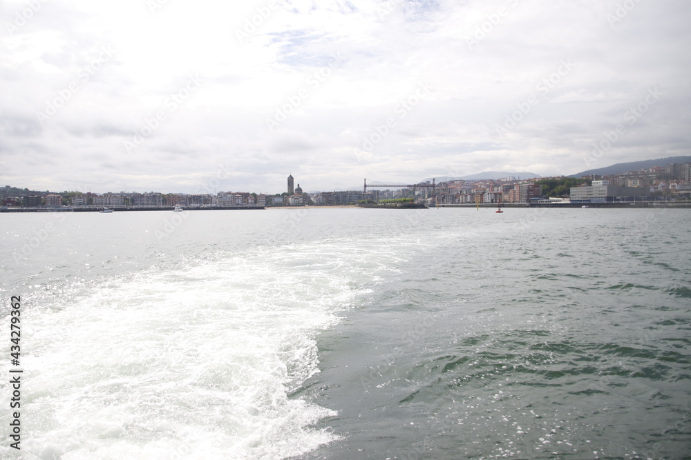 Wake ofa boat in the estuary of Bilbao