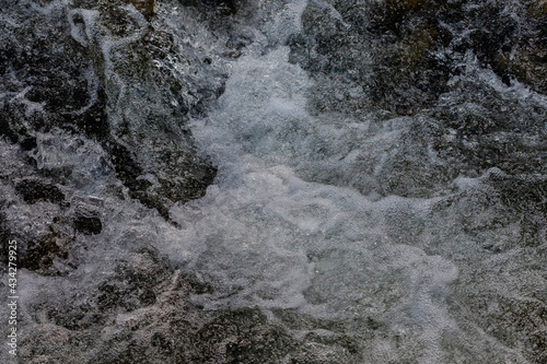 The seething water of a mountain river