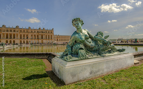 Versailles, April 17th 2019 : Bronze sculpture in the garden of castle Versailles, France.